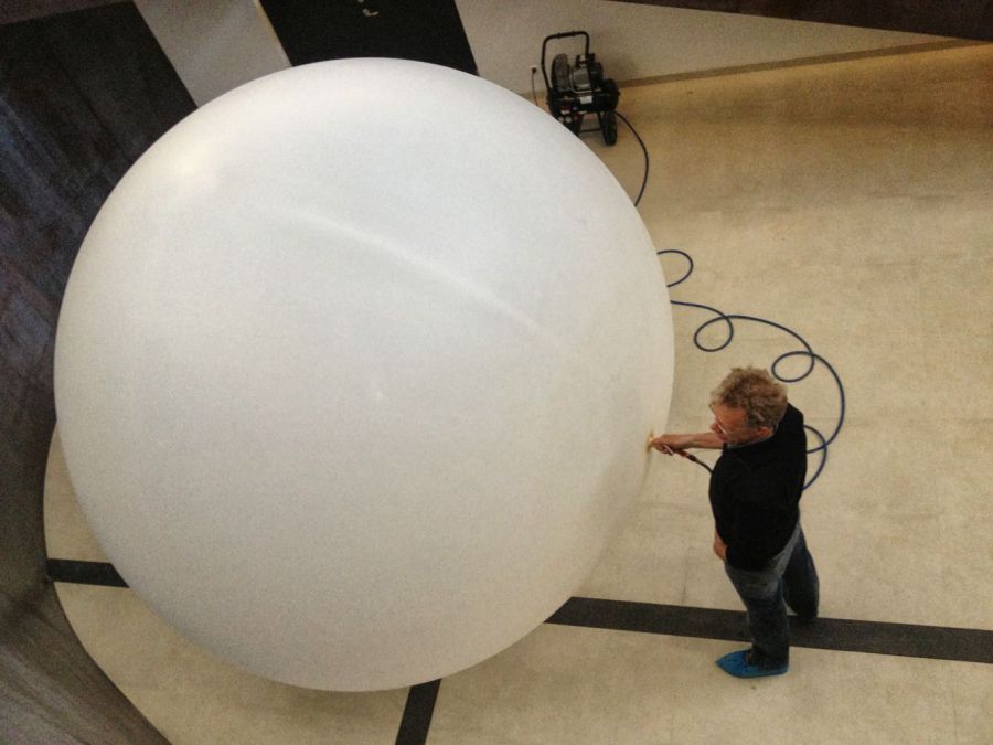 A balloon test to decide the size of the apple. It took 3 hours to fill the balloon